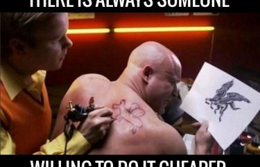 pic of a guy getting a bad tattoo
